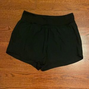 Black size 8 high rise Lululemon shorts. Worn once